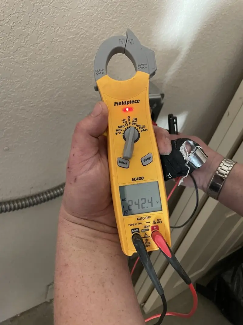 Voltage testing with clamp meter during Generator Installation in Sedro-Woolley